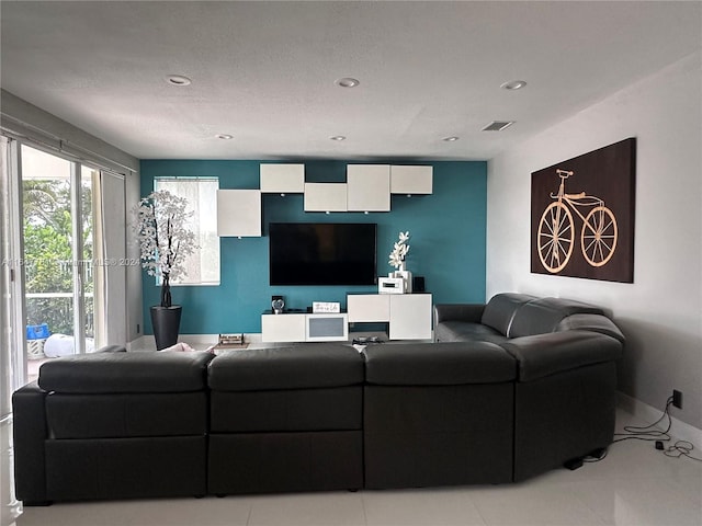 living room with light tile patterned floors