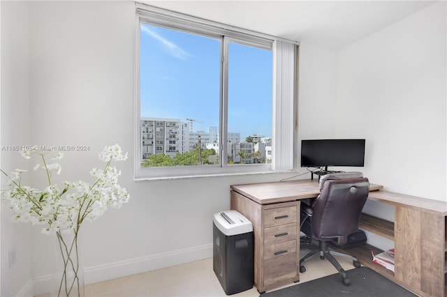 office space featuring light tile patterned floors