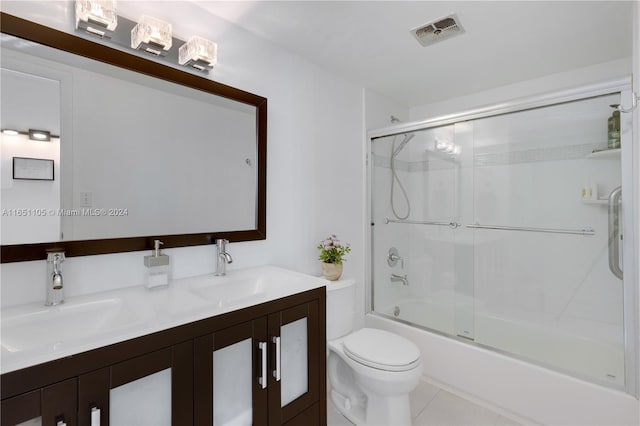 1080 94th St Unit 411, Bay Harbor Islands, FL 33154 - full bath featuring double vanity, bath / shower combo with glass door, and tile patterned floors