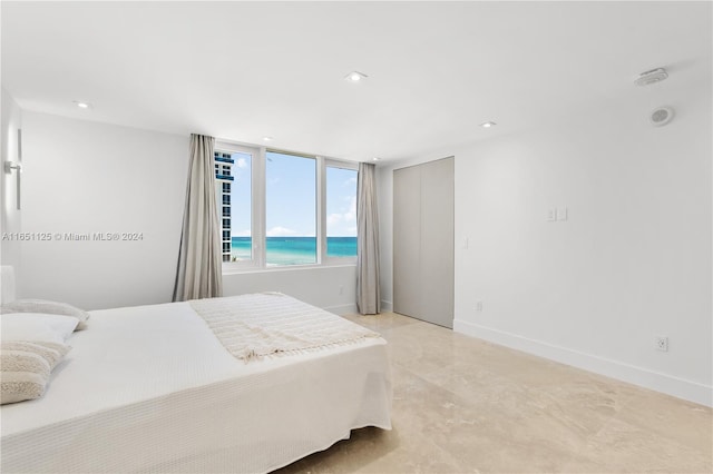 bedroom with a water view