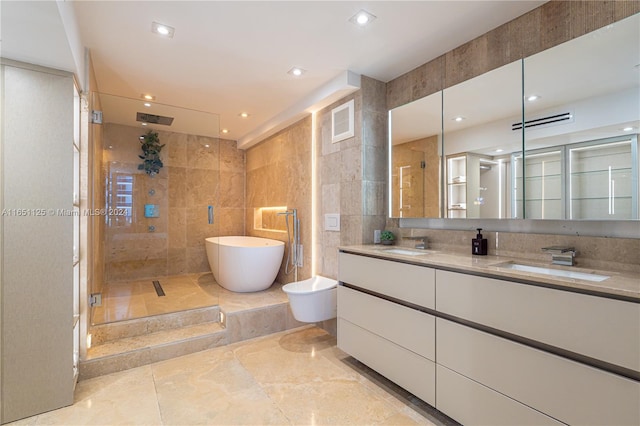 bathroom featuring vanity, tile walls, and plus walk in shower