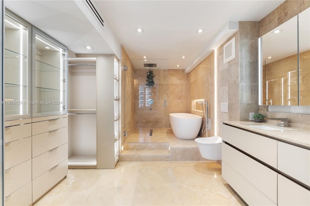 bathroom with vanity, independent shower and bath, and tile walls