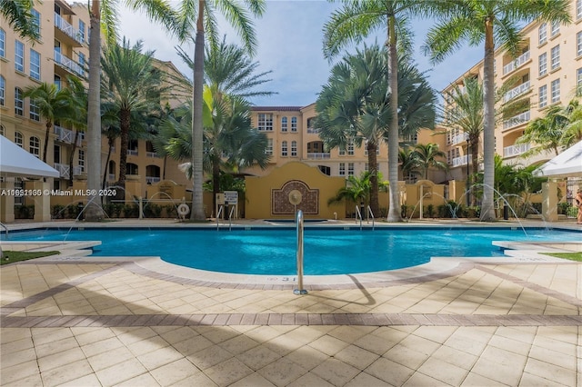 view of pool featuring pool water feature