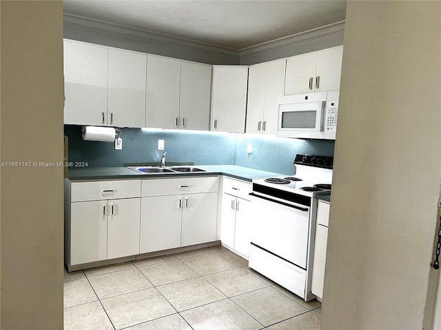 kitchen with white cabinets, light tile patterned floors, white appliances, sink, and tasteful backsplash