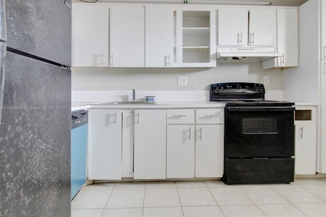 kitchen with black appliances, white cabinets, light tile patterned floors, and sink