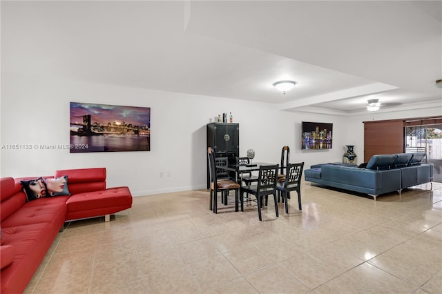 dining space featuring light tile patterned floors