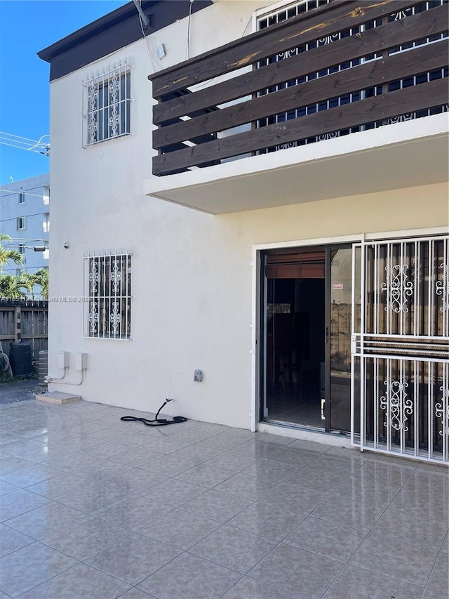 property entrance with a patio