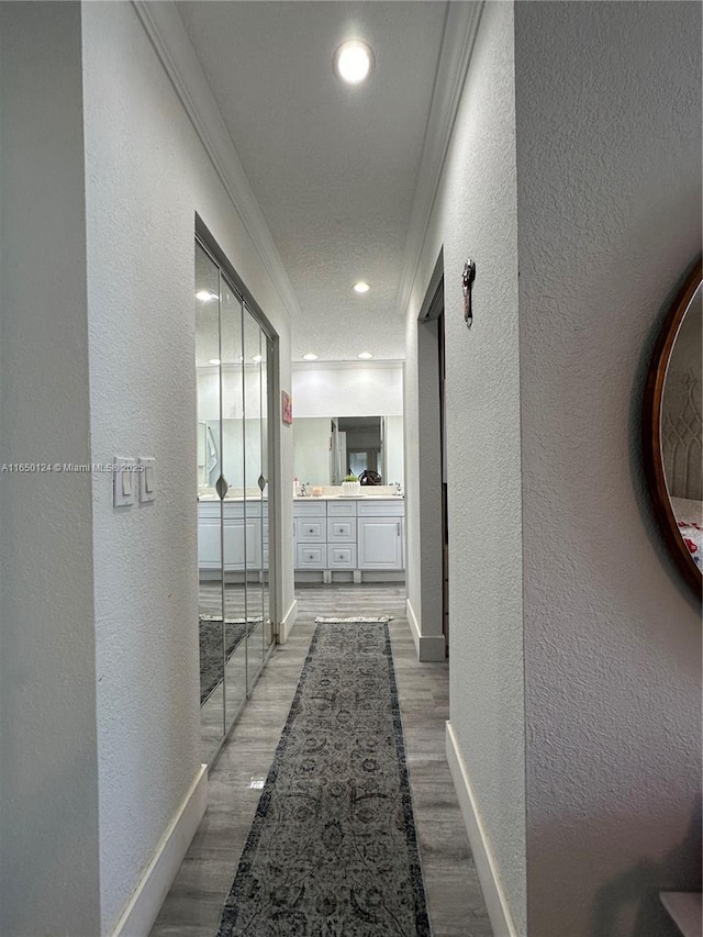 23304 SW 58th Ave Unit B, Boca Raton, FL 33428 - corridor with a textured wall, crown molding, baseboards, wood finished floors, and recessed lighting