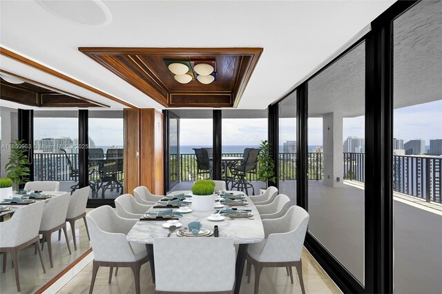 936 Intracoastal Dr Unit Ph4, Fort Lauderdale, FL 33304 - dining room featuring a tray ceiling and plenty of natural light