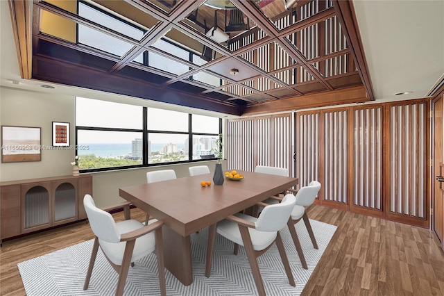 936 Intracoastal Dr Unit Ph4, Fort Lauderdale, FL 33304 - dining space with light wood-style flooring, coffered ceiling, and baseboards