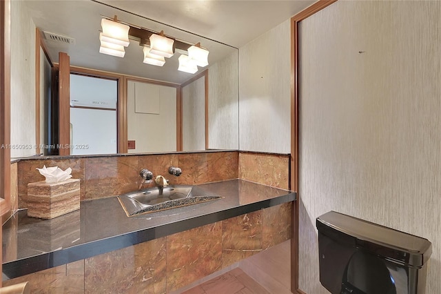 936 Intracoastal Dr Unit Ph4, Fort Lauderdale, FL 33304 - bathroom featuring a sink and tasteful backsplash