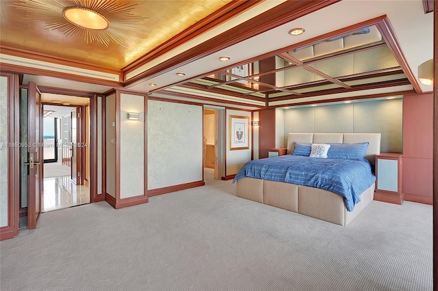 carpeted bedroom featuring ceiling fan, crown molding, and coffered ceiling