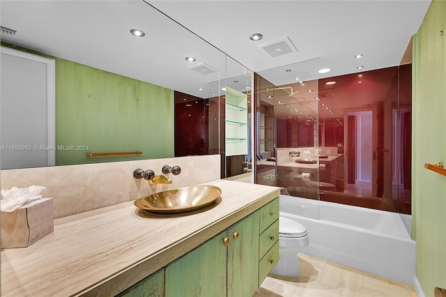 full bathroom with toilet, tile patterned flooring, enclosed tub / shower combo, and vanity