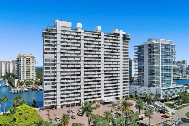 view of building exterior with a water view