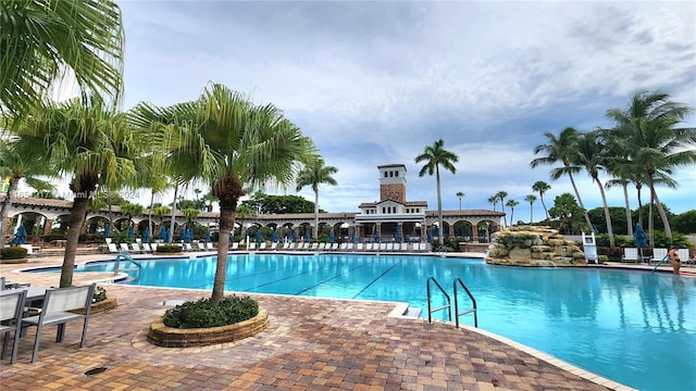 view of swimming pool featuring a patio