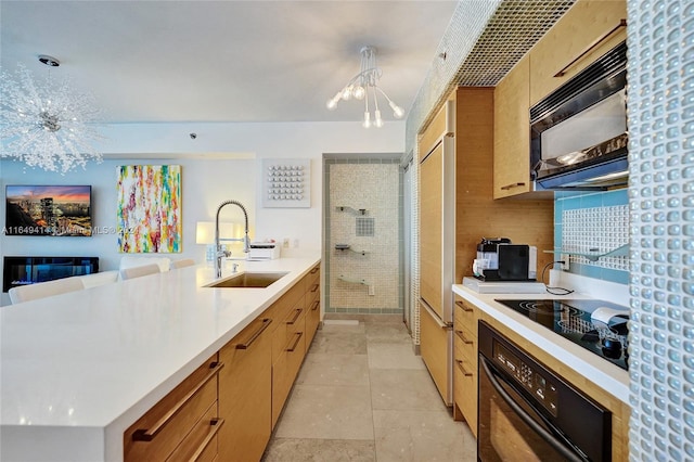 kitchen featuring an inviting chandelier, black appliances, light tile patterned floors, sink, and decorative backsplash