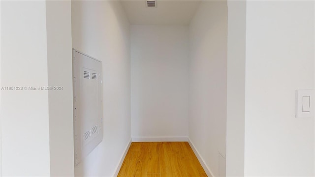 hallway with light wood-type flooring