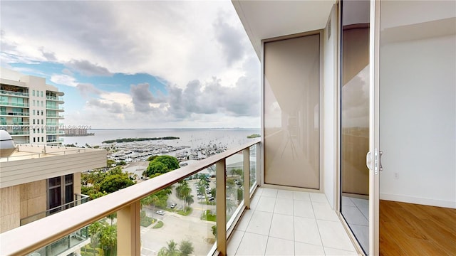 balcony featuring a water view