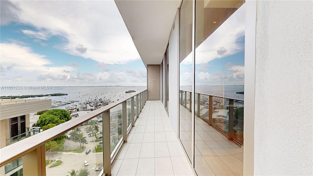 balcony featuring a water view