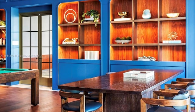 interior space with pool table, wood-type flooring, and french doors