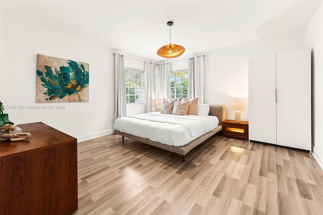 bedroom featuring light hardwood / wood-style flooring