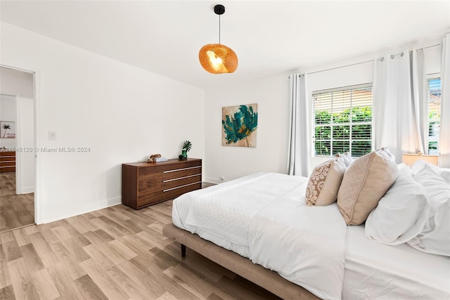 bedroom featuring light wood-type flooring