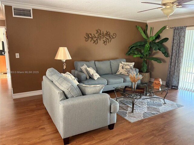 700 Layne Blvd Unit 212, Hallandale Beach, FL 33009 - living area with ornamental molding and wood finished floors