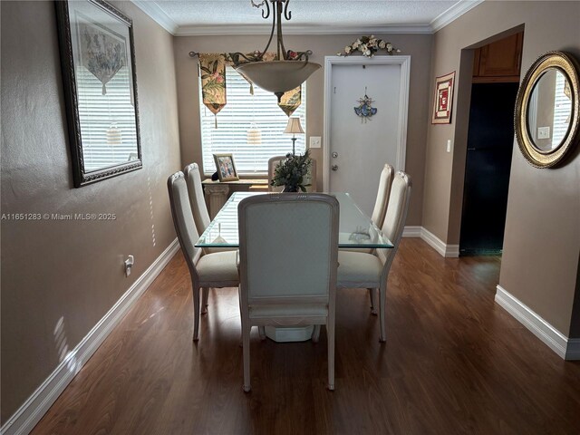 700 Layne Blvd Unit 212, Hallandale Beach, FL 33009 - dining room with wood finished floors, crown molding, and baseboards