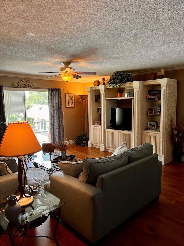 living room featuring hardwood / wood-style flooring and ceiling fan