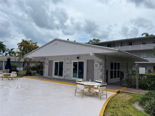 700 Layne Blvd Unit 212, Hallandale Beach, FL 33009 - rear view of house featuring a patio and stucco siding