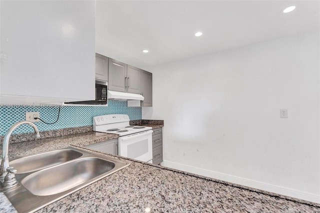 kitchen with gray cabinetry, white range with electric stovetop, sink, and tasteful backsplash