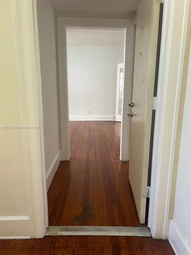 hallway featuring hardwood / wood-style floors