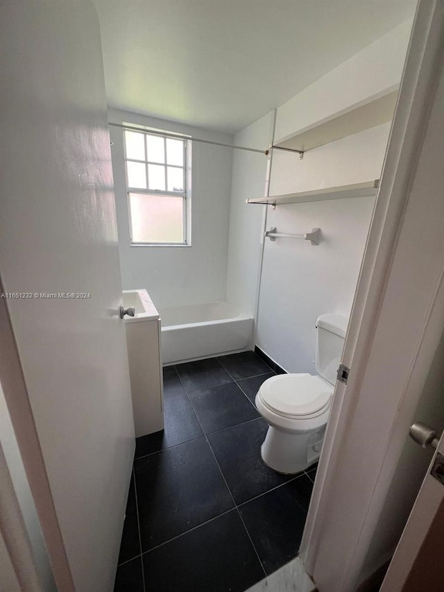 full bathroom featuring tile patterned flooring, vanity, toilet, and shower / bathing tub combination