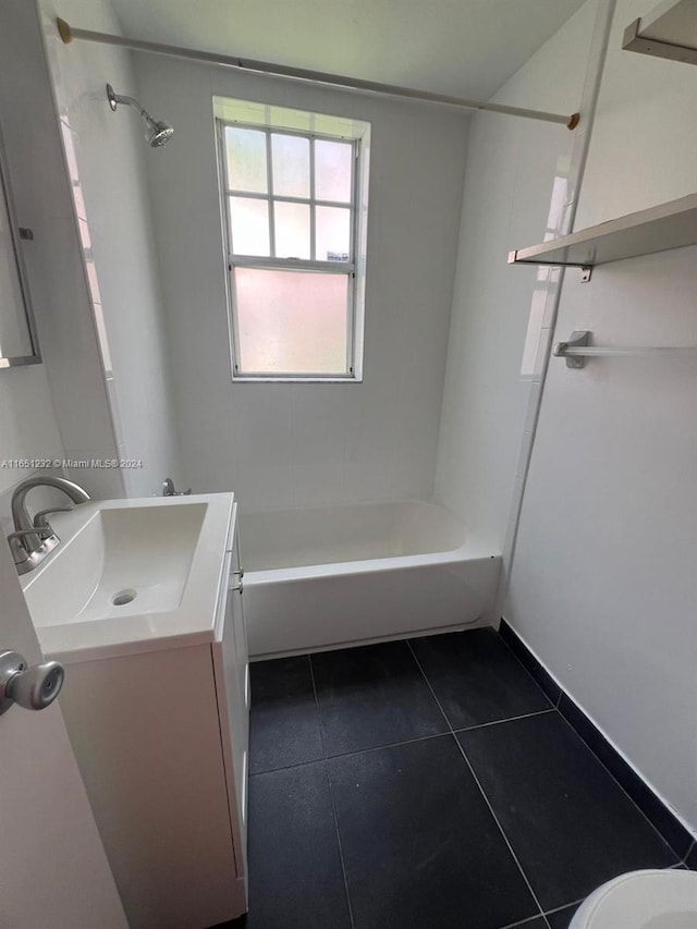 full bathroom with vanity, toilet, tile patterned flooring, and tub / shower combination