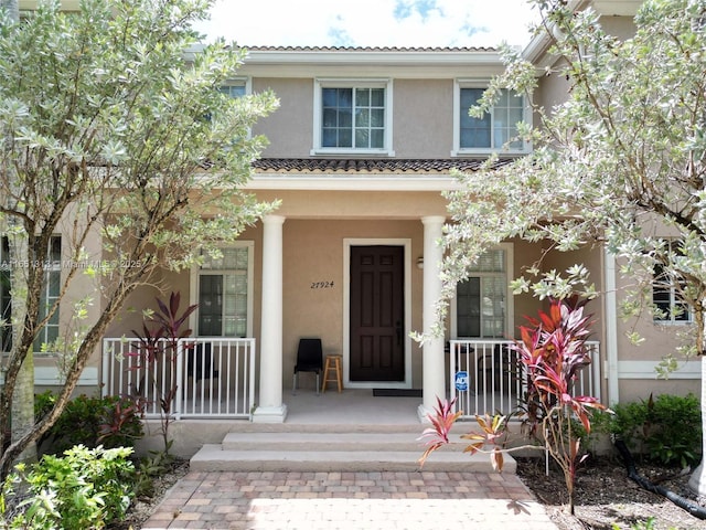 view of front of home featuring covered porch