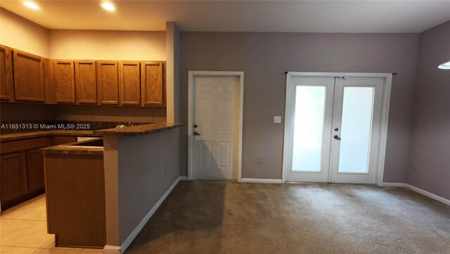 living room featuring carpet floors and a textured ceiling