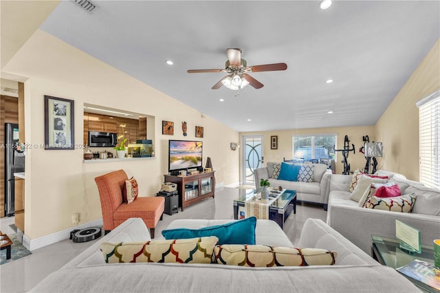 living room featuring lofted ceiling and ceiling fan