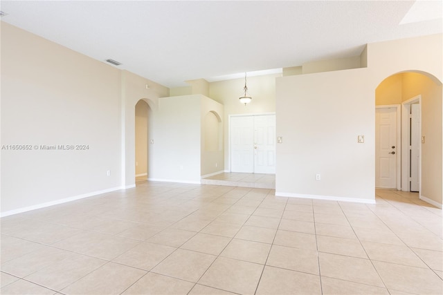 view of tiled spare room