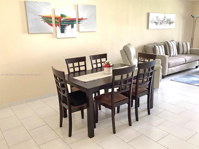 dining room with light tile patterned floors