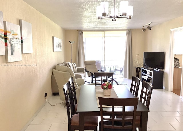 611 S Hollybrook Dr Unit 102, Pembroke Pines, FL 33025 - dining room with light tile patterned floors and a chandelier
