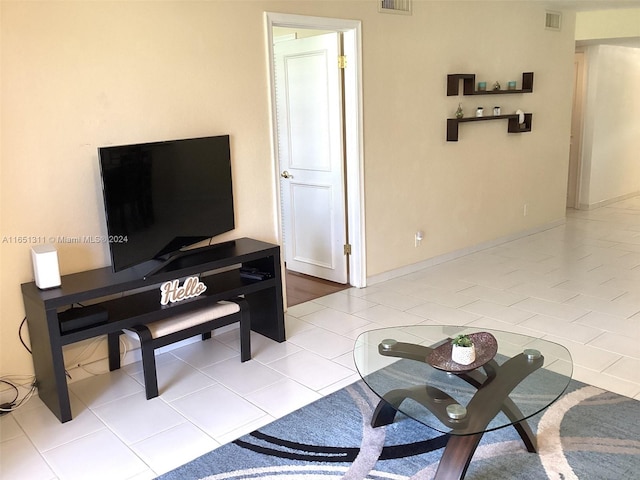 living room featuring light tile patterned floors