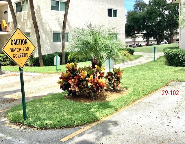 611 S Hollybrook Dr Unit 102, Pembroke Pines, FL 33025 - view of green lawn