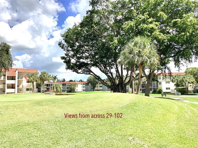 611 S Hollybrook Dr Unit 102, Pembroke Pines, FL 33025 - view of grassy yard