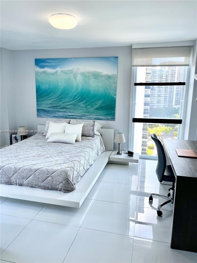 bedroom with tile patterned floors