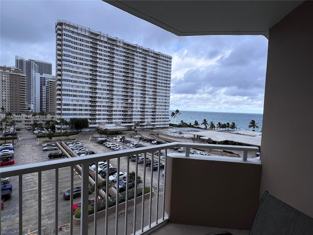 balcony featuring a water view