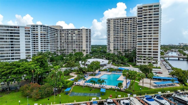 exterior space featuring a view of city and a water view