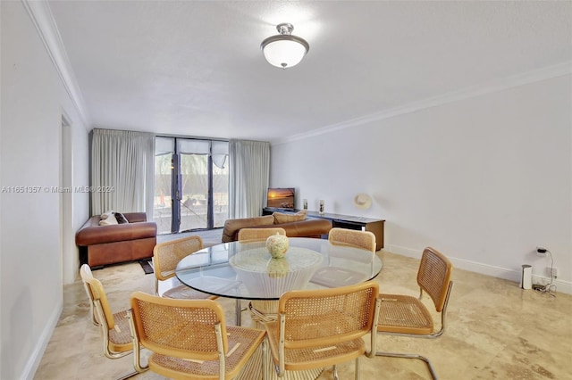9801 Collins Ave Unit 3T, Bal Harbour, FL 33154 - dining room featuring baseboards and ornamental molding