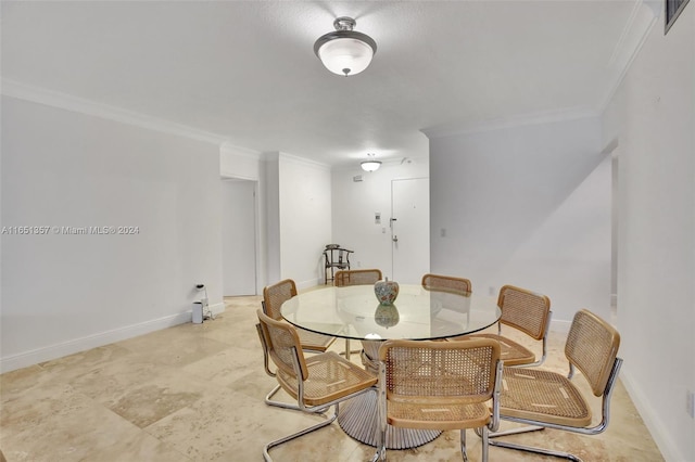 9801 Collins Ave Unit 3T, Bal Harbour, FL 33154 - dining space featuring crown molding and baseboards