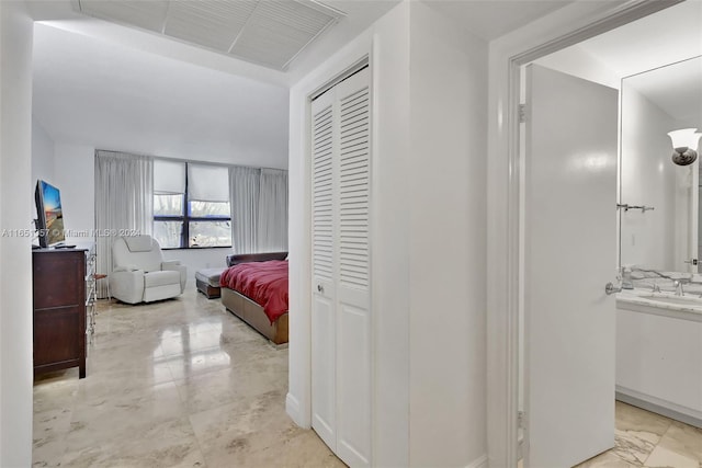 9801 Collins Ave Unit 3T, Bal Harbour, FL 33154 - bedroom featuring a closet, a sink, and visible vents