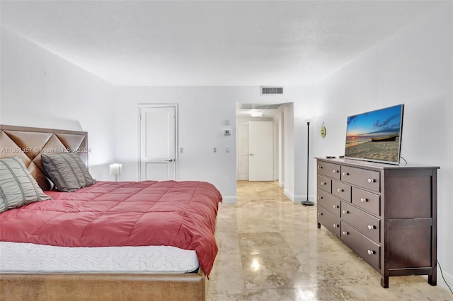 9801 Collins Ave Unit 3T, Bal Harbour, FL 33154 - bedroom featuring visible vents and baseboards